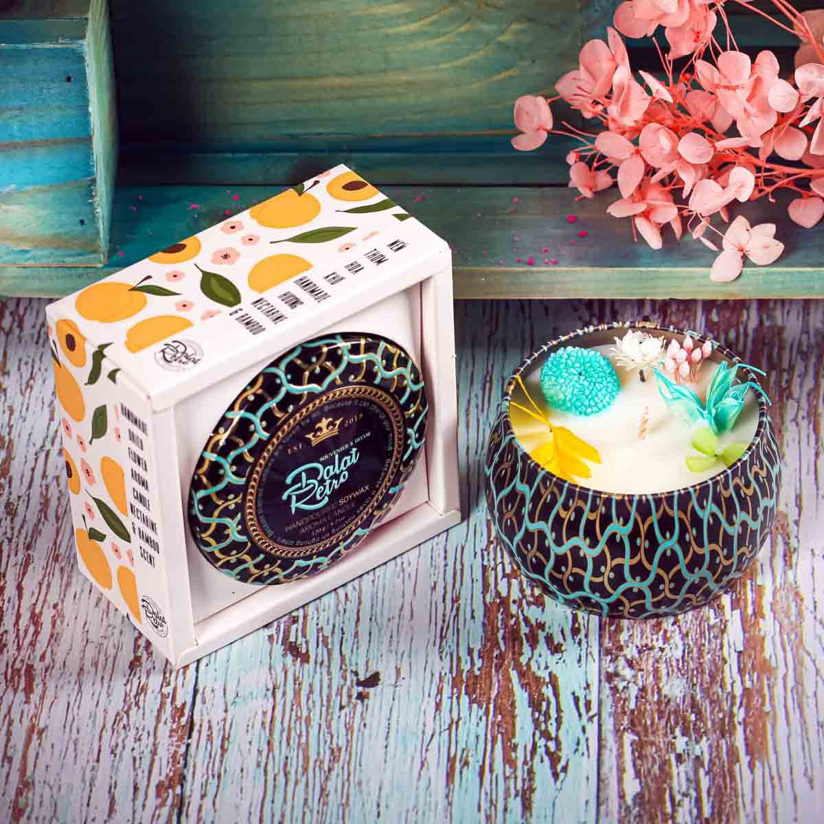Nến thơm hộp thiết hoa văn: Quả xuân đào và tre